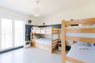 Гостевой дом Apartments and rooms Villa Santa Vita Петровац Четырехместный номер Делюкс-6