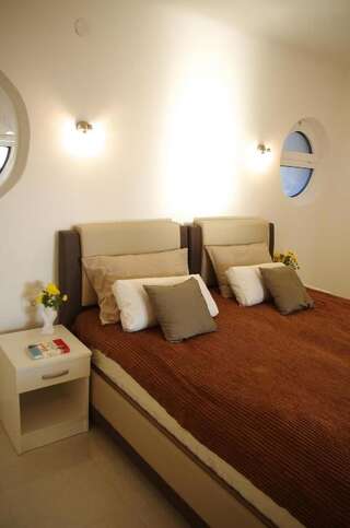 Гостевой дом Apartments and rooms Villa Santa Vita Петровац Апартаменты с 1 спальней-13